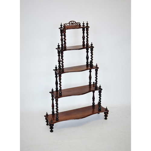 678 - A Victorian rosewood what not, with five graduated serpentine tiers, the upper tier with an openwork... 