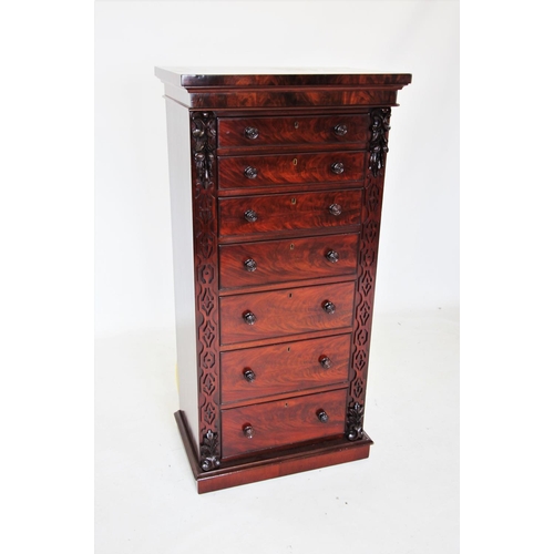 680 - A mid 19th century mahogany Wellington chest, the rectangular top above seven graduated and cock bea... 