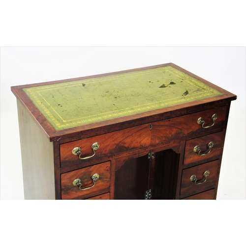 685 - A 19th century mahogany knee hole desk, the rectangular top with an inset leather writing surface, a... 