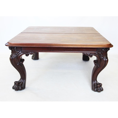 691 - A mid 19th century mahogany extending dining table, the rectangular thumb moulded top with rounded c... 