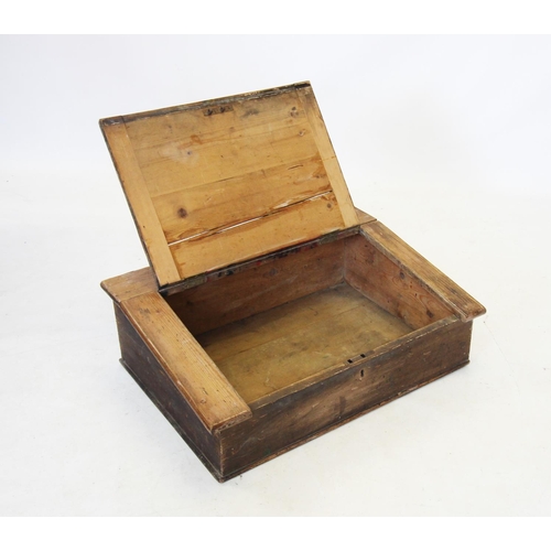 694 - A 19th century pine bible box, of hinged sloping form with a vacant interior, 26cm H x 80cm W x 57cm... 