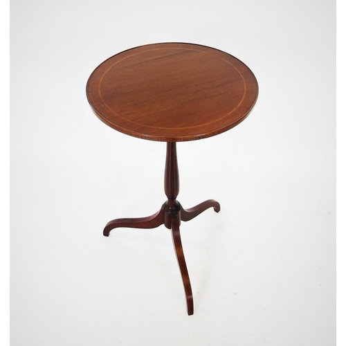 710 - An Edwardian mahogany lamp table by Whittle and Son, Whitehaven, the circular top rim with rail effe... 