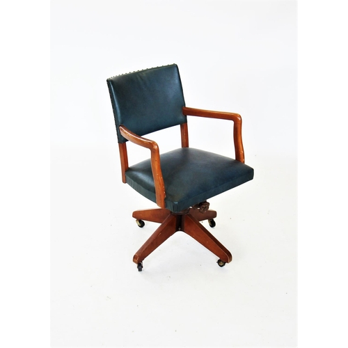 715 - A mid 20th century revolving office desk chair, with padded back and sprung seat enclosed by stained... 