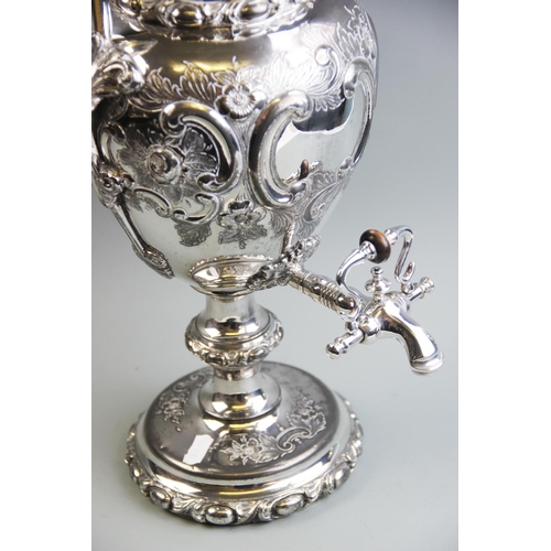 81 - A silver plated samovar, late 19th/early 20th century, of urn form, with relief cast floral and foli... 