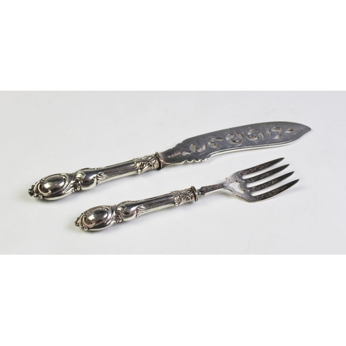 83 - A pair of Victorian silver fish servers, John Gilbert, Birmingham 1859, both with moulded foliate sc... 