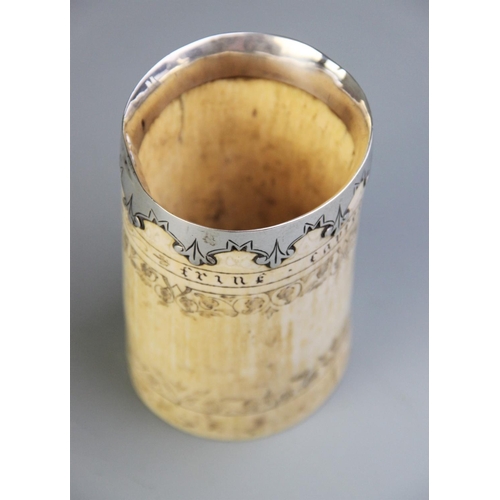 87 - A white metal mounted scrimshaw tusk pot, inscribed 'Frine favfer und fief' below the metal mounted ... 