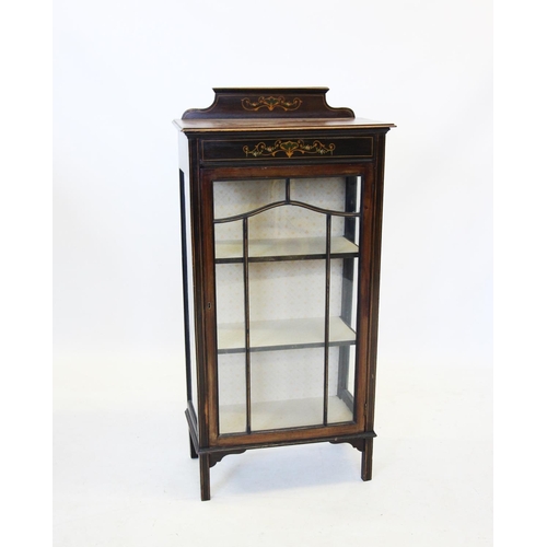 698 - An Edwardian mahogany display cabinet, with painted foilate swags above a single glazed door, enclos... 