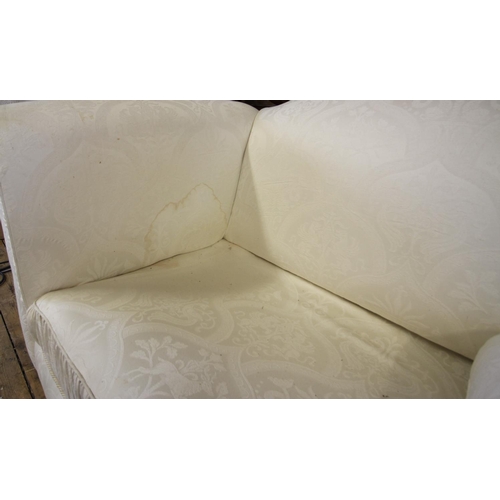 736 - A pair of contemporary Chesterfield type settees, in white fabric, the padded scroll arms enclosing ... 