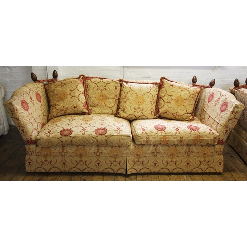 738 - A Knole settee, late 20th century, the drop ends with rope ties, enclosing two seat cushions and a s... 