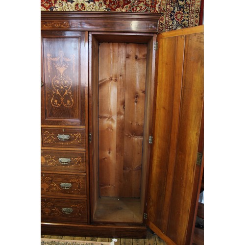 683 - A late 19th century rosewood compactum wardrobe, the moulded cornice above a frieze inlaid with scro... 