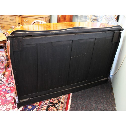 662 - A Victorian burr walnut credenza, the shaped moulded top with satinwood cross banding, above a gilt ... 