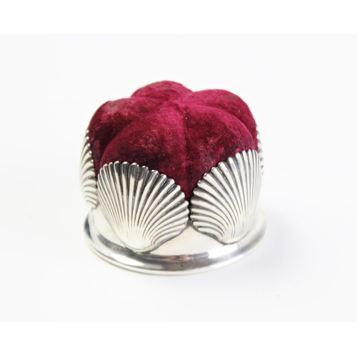 77 - A Victorian silver pin cushion by Horace Woodward & Co, London 1888, designed as five clam shells su... 