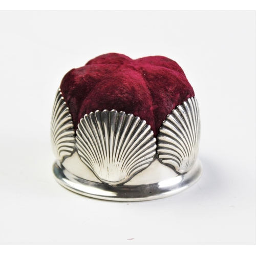 77 - A Victorian silver pin cushion by Horace Woodward & Co, London 1888, designed as five clam shells su... 