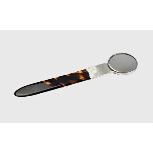 80 - An Edwardian silver mounted tortoiseshell combination hand mirror and page turner, Goldsmiths & Silv... 