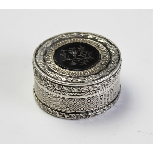 81 - A French silver and tortoiseshell patch box, 19th century, of circular form with removable cover enc... 