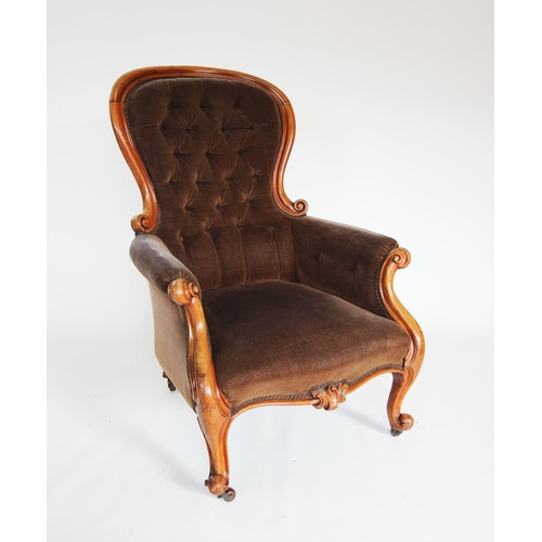 844 - A Victorian mahogany show frame button back drawing room chair, the spoon back with a mahogany frame... 