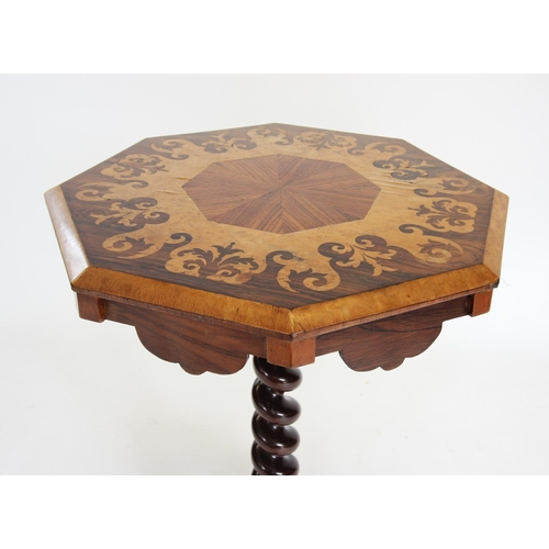 855 - A mid 19th century rosewood pedestal lamp table, the octagonal top inlaid with burr thuya and raised... 