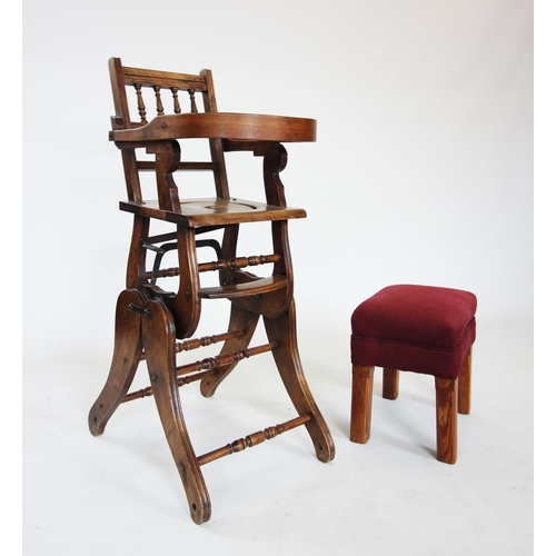 859 - A Victorian child's metamorphic beech wood high chair, with turned spindles above a pivoted half moo... 