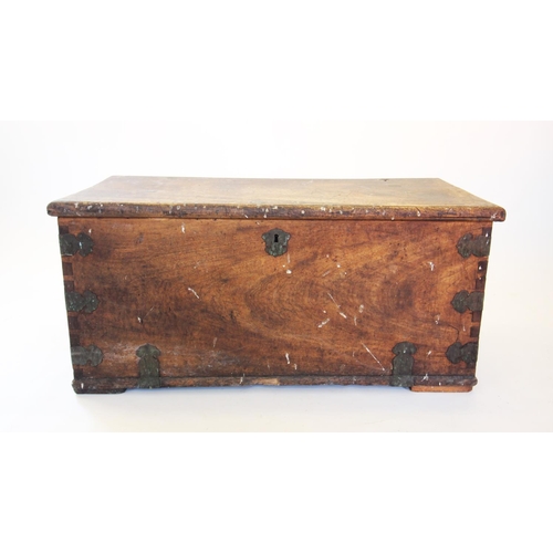 860A - A 19th century hardwood chest, applied with shaped brass corner brackets and brass side swing handle... 