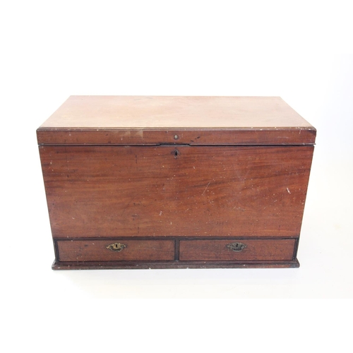 863 - A 19th century campaign type mahogany chest, the rectangular moulded hinged cover, above brass side ... 