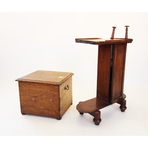 865 - A Victorian mahogany commode stool, with flushing system, the hinged lid enclosing a turned cover an... 