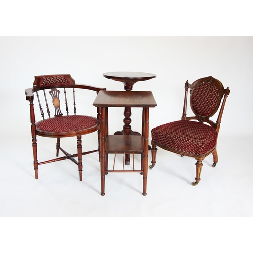 883 - An Edwardian mahogany corner chair, with an inlaid pierced splat above an oval padded seat, raised u... 