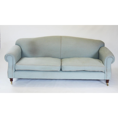 891 - A 19th century style sofa, late 20th century, in pale blue fabric, the arched padded back above subs... 