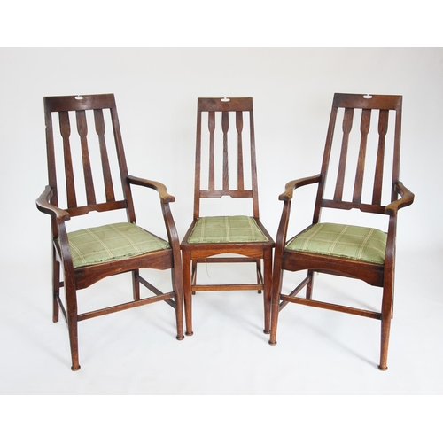 893 - Three early 20th century oak Arts and Crafts chairs, each with an angular tapering back with three s... 