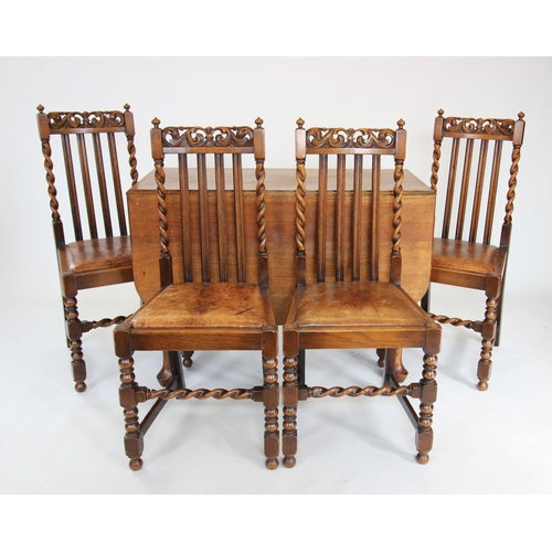 897 - A set of six 17th century revival oak dining chairs, circa 1920, each with a carved open work crest ... 