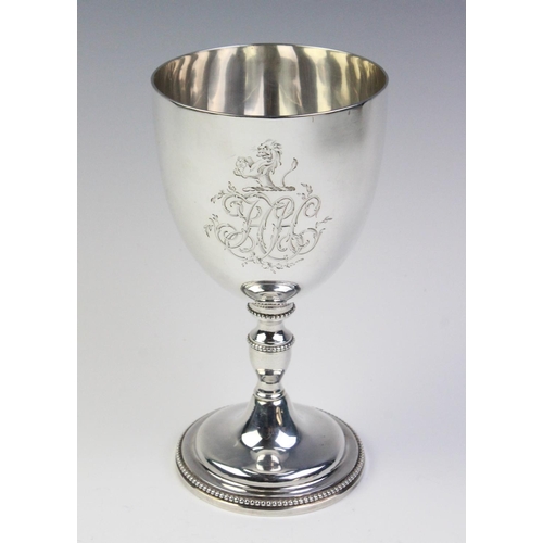 12 - A silver Chalice by John Denzilow, London 1818, of typical form with beaded detail to knopped stem a... 