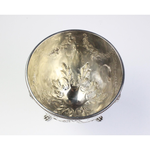 13 - A late Victorian silver caddy by Martin, Hall & Co, Sheffield 1893, the urn shaped body resting on t... 