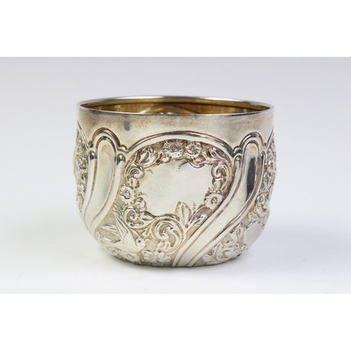16 - A Victorian silver sugar bowl by Goldsmiths & Silversmiths Co, London 1895, the exterior panels with... 