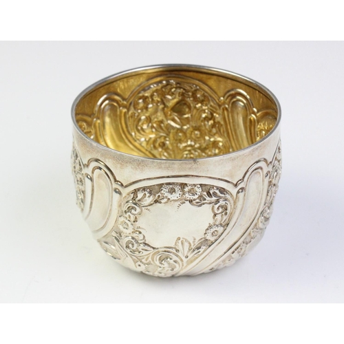 16 - A Victorian silver sugar bowl by Goldsmiths & Silversmiths Co, London 1895, the exterior panels with... 