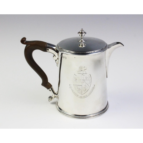19 - A George III silver hot water jug, London 1790, of tapered cylindrical form with scrolling wood hand... 