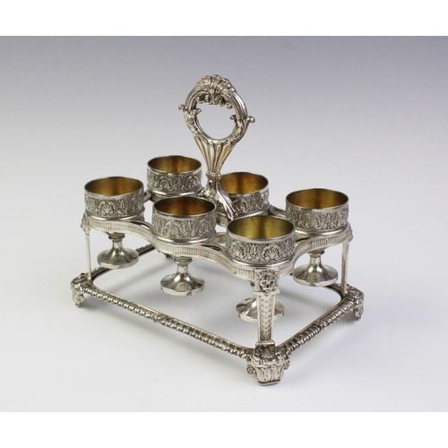 24 - A George III silver egg cruet by Phillip Rundell, London 1819, the rectangular stand with gadrooned ... 