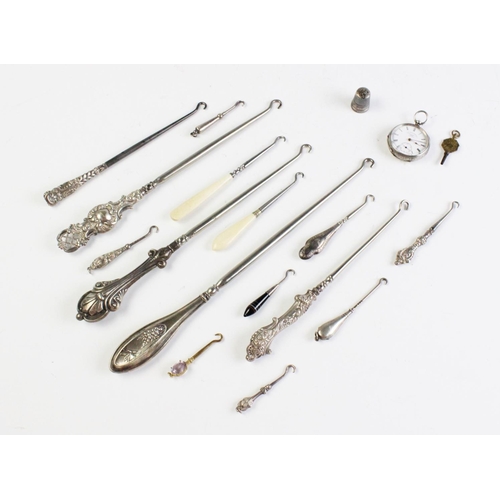 40 - A selection of Victorian and later silver and white metal button hooks, assorted makers, sizes and s... 