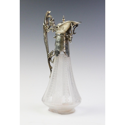 46 - A Victorian silver mounted cut glass claret jug, marks for 'WP', Sheffield 1876, of tapering form on... 