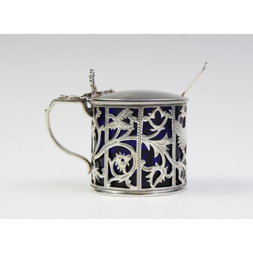 48 - A Victorian silver mustard pot by Charles Stuart Harris, London 1891, of cylindrical form with pierc... 