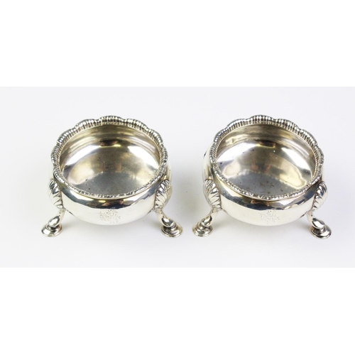 50 - A pair of George III silver salt cellars by D & R Hennell, London 1759, of cauldron form with gadroo... 