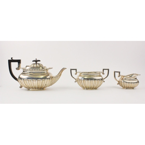 8 - MILITARY INTEREST: An Edwardian three-piece silver tea service by Charles Westwood & Sons, Birmingha... 