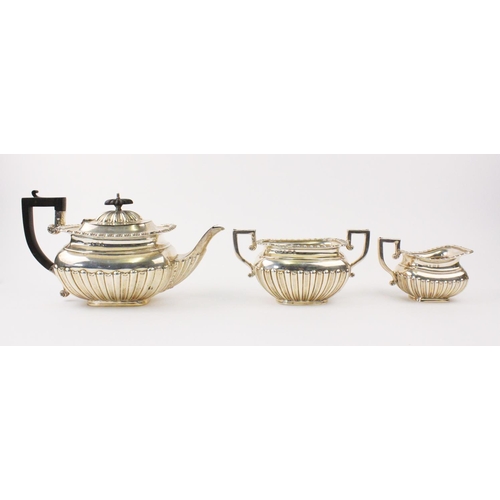 8 - MILITARY INTEREST: An Edwardian three-piece silver tea service by Charles Westwood & Sons, Birmingha... 