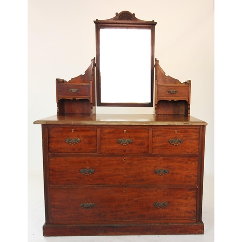 853 - A late Victorian mahogany dressing chest, the rectangular tilting mirror above a rectangular moulded... 