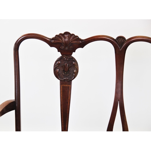 889 - An early 20th century Chippendale revival twin seat mahogany chair, with two carved shell crests abo... 