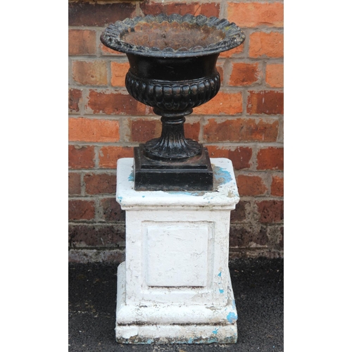 914 - A pair of painted Victorian cast iron garden urns, of lobed bowl form with a cast scalloped rim, rai... 