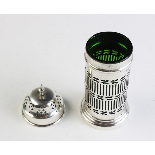 34 - A silver sugar caster by Barker Brothers, Chester 1912, of cylindrical form with pierced decoration ... 
