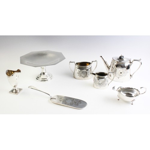 83 - A selection of white metal table wares, to include, a George III style sauce boat by Adie Brothers, ... 