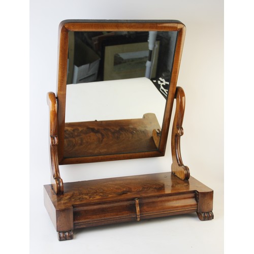 851 - A Victorian mahogany dressing table mirror, the rectangular tilting mirror raised upon 'S' shaped su... 