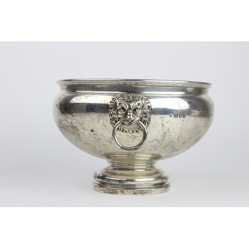 2 - A silver punch bowl by Edward Barnard & Sons Ltd, London 1935, of circular form on pedestal foot, wi... 