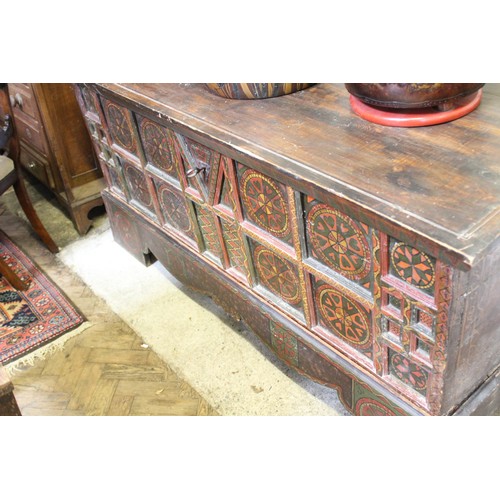 870 - A 19th century Eastern European painted folk art pine chest, painted with geometric designs, the hin... 