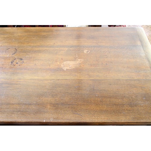 852 - A 17th century style oak plank top table, 20th century, the cleated plank top raised upon ring turne... 